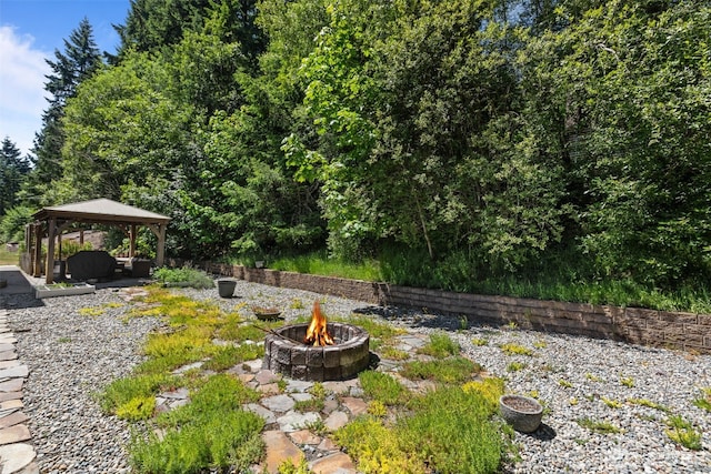 6830 SE Arlington Pl, Port Orchard, WA 98367 - view of yard with a fire pit and a gazebo