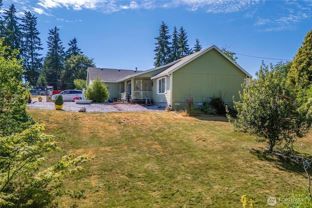 9923 74th Ave E, Puyallup, WA 98373 - rear view of property with a yard
