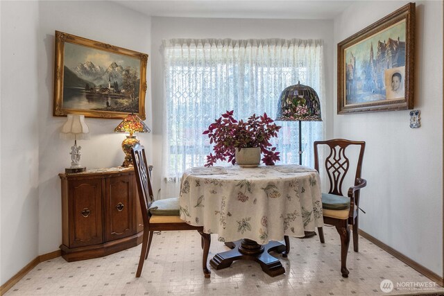 9923 74th Ave E, Puyallup, WA 98373 - dining space featuring light floors and baseboards