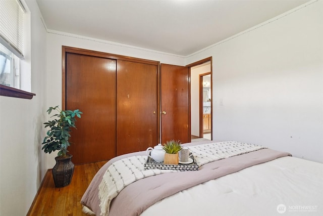 411 15th Ave, Milton, WA 98354 - bedroom featuring a closet and wood finished floors