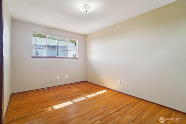 411 15th Ave, Milton, WA 98354 - empty room featuring wood finished floors