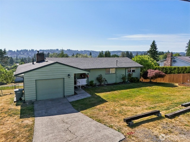 411 15th Ave, Milton, WA 98354 - ranch-style house with a garage, a chimney, and concrete driveway