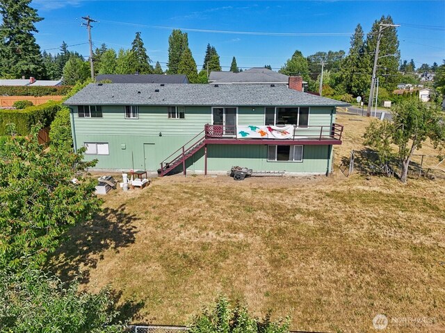 411 15th Ave, Milton, WA 98354 - back of house featuring stairs, a yard, and a deck