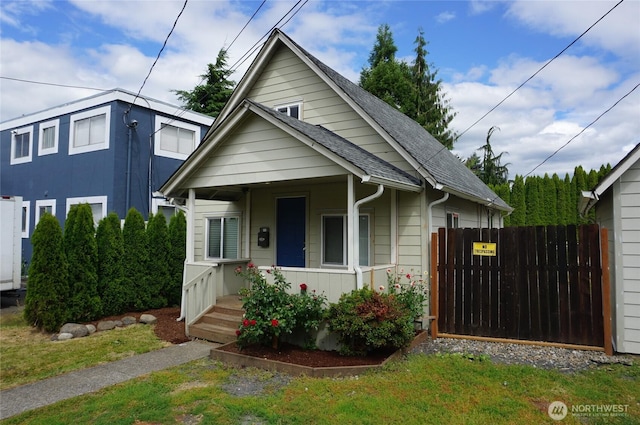 608 S 6th Ave, Kelso, WA 98626 - bungalow-style home with covered porch and roof with shingles