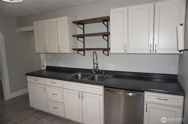608 S 6th Ave, Kelso, WA 98626 - kitchen with dishwasher, open shelves, dark countertops, white cabinetry, and a textured ceiling