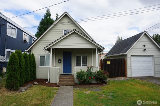 608 S 6th Ave, Kelso, WA 98626 - view of front of home with a detached garage and a porch