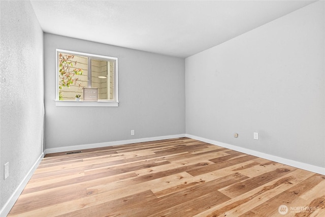 3104 Bill Mcdonald Pkwy Unit D104, Bellingham, WA 98225 - empty room featuring wood finished floors and baseboards