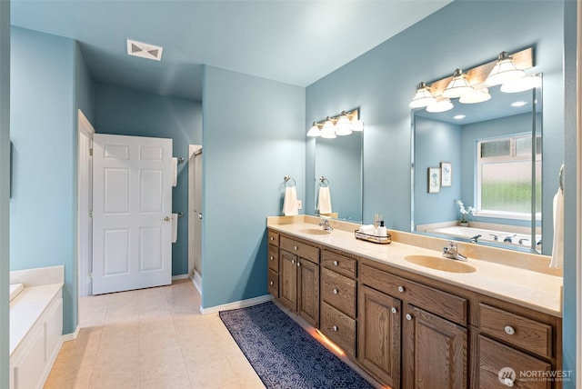 7506 Hawkstone Ave SW, Port Orchard, WA 98367 - full bath with double vanity, a garden tub, and a stall shower