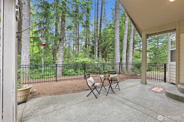 7506 Hawkstone Ave SW, Port Orchard, WA 98367 - view of patio with view of wooded area