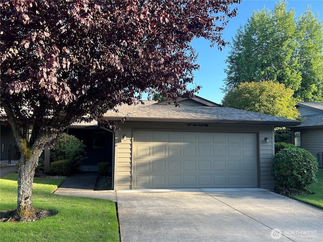 7908 53rd St W, University Place, WA 98467 - view of front of home featuring a front yard and a shingled roof