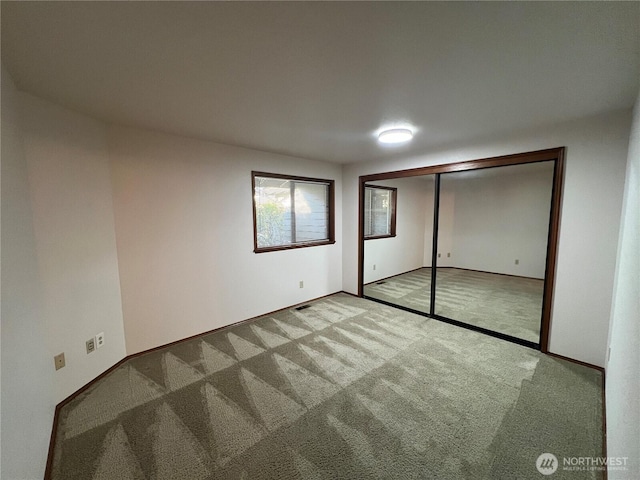 7908 53rd St W, University Place, WA 98467 - unfurnished bedroom featuring carpet flooring and a closet