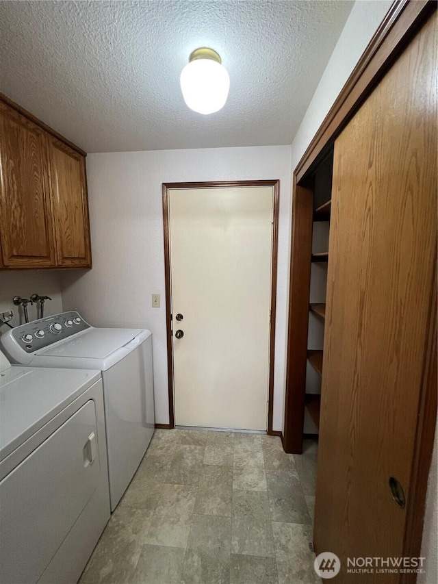7908 53rd St W, University Place, WA 98467 - laundry area with cabinet space, independent washer and dryer, and a textured ceiling