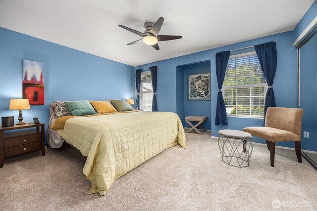 15600 116th Ave NE Unit E4, Bothell, WA 98011 - bedroom featuring carpet and a ceiling fan
