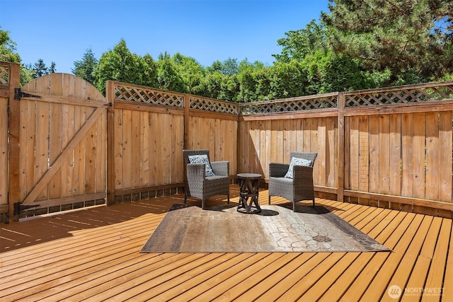 15600 116th Ave NE Unit E4, Bothell, WA 98011 - wooden deck with a gate