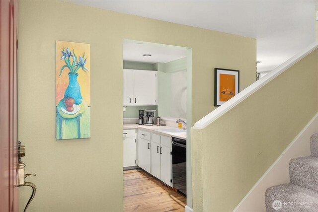 15600 116th Ave NE Unit E4, Bothell, WA 98011 - bar area featuring dishwasher, stairs, and light wood finished floors