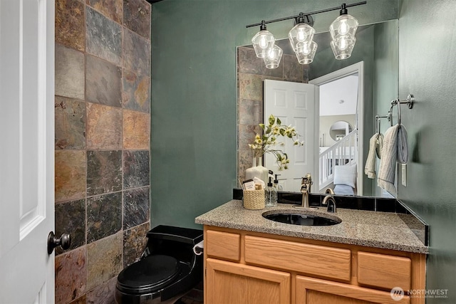 1125 Hemlock Ave SW, North Bend, WA 98045 - bathroom featuring vanity and toilet