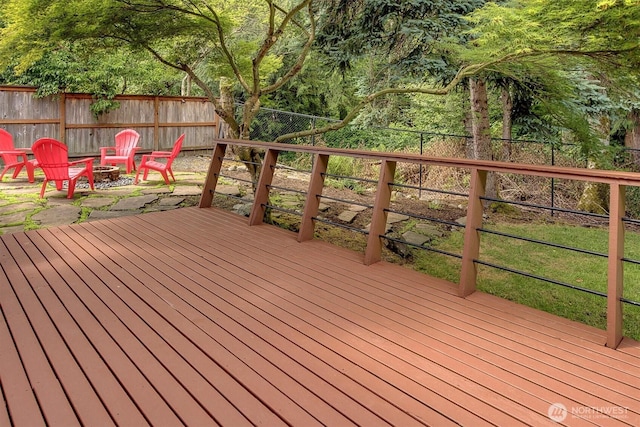 1125 Hemlock Ave SW, North Bend, WA 98045 - deck featuring a fire pit and a fenced backyard