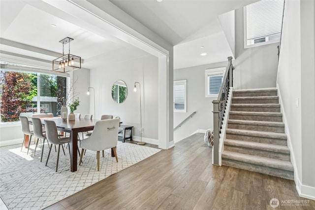 7223 NE 118th Ct, Kirkland, WA 98034 - dining space with wood finished floors, stairs, recessed lighting, and a chandelier