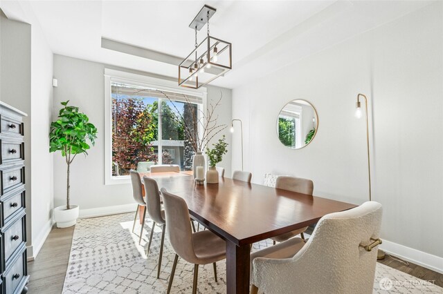 7223 NE 118th Ct, Kirkland, WA 98034 - dining room with a chandelier and light wood finished floors