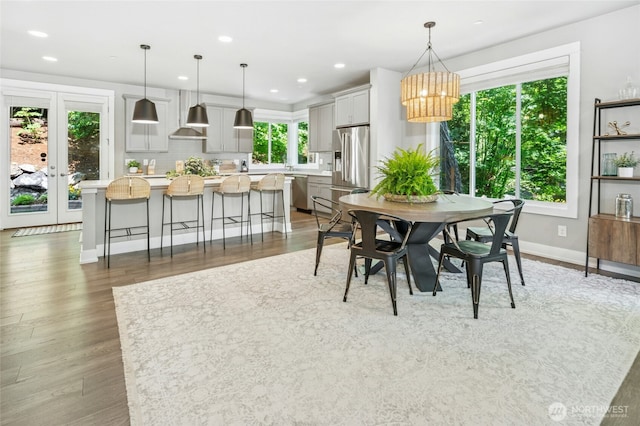 7223 NE 118th Ct, Kirkland, WA 98034 - dining space featuring a chandelier, wood finished floors, recessed lighting, and french doors