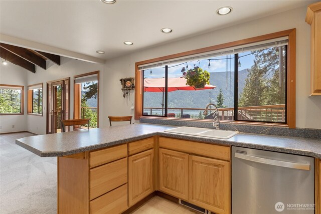 16537 Lakeview Dr, Leavenworth, WA 98826 - kitchen featuring stainless steel dishwasher, recessed lighting, a peninsula, dark countertops, and light brown cabinets