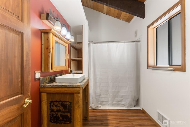 16537 Lakeview Dr, Leavenworth, WA 98826 - full bath featuring wood ceiling, wood finished floors, vanity, and a shower with shower curtain