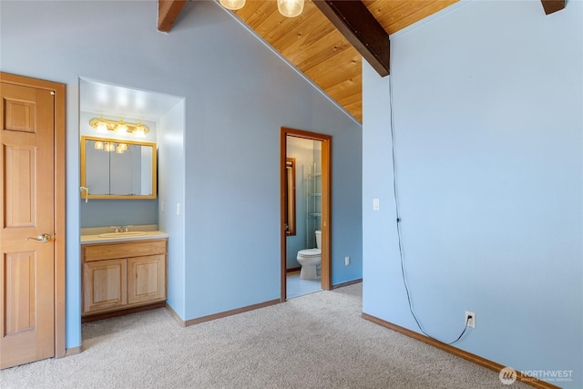 16537 Lakeview Dr, Leavenworth, WA 98826 - bedroom with wood ceiling, light carpet, and ensuite bath