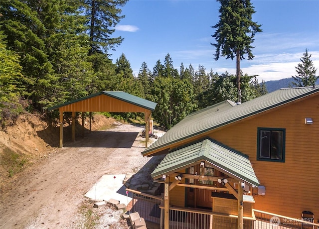 16537 Lakeview Dr, Leavenworth, WA 98826 - back of property featuring driveway, a carport, and a metal roof