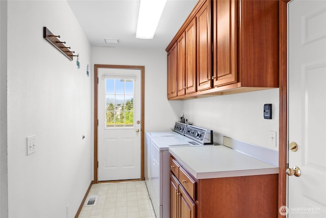 3505 Kimberly Ct, Wenatchee, WA 98801 - laundry room with cabinet space and washing machine and clothes dryer