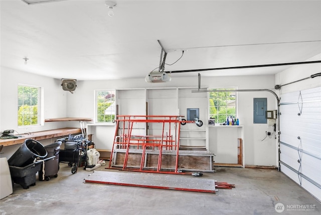 3505 Kimberly Ct, Wenatchee, WA 98801 - garage featuring electric panel and a garage door opener