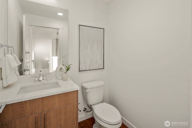 2749 Clare Ave Unit 1, Bremerton, WA 98310 - bathroom featuring vanity, wood finished floors, and recessed lighting