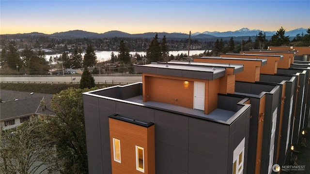 2749 Clare Ave Unit 1, Bremerton, WA 98310 - patio terrace at dusk with a mountain view