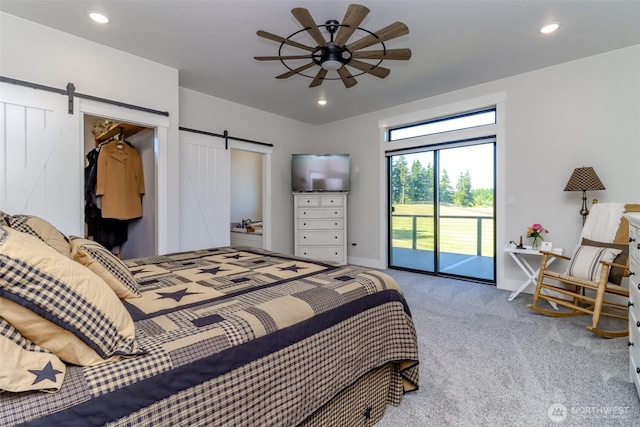 14045 Solberg Rd SE, Yelm, WA 98597 - carpeted bedroom with a barn door, access to outside, recessed lighting, and a ceiling fan