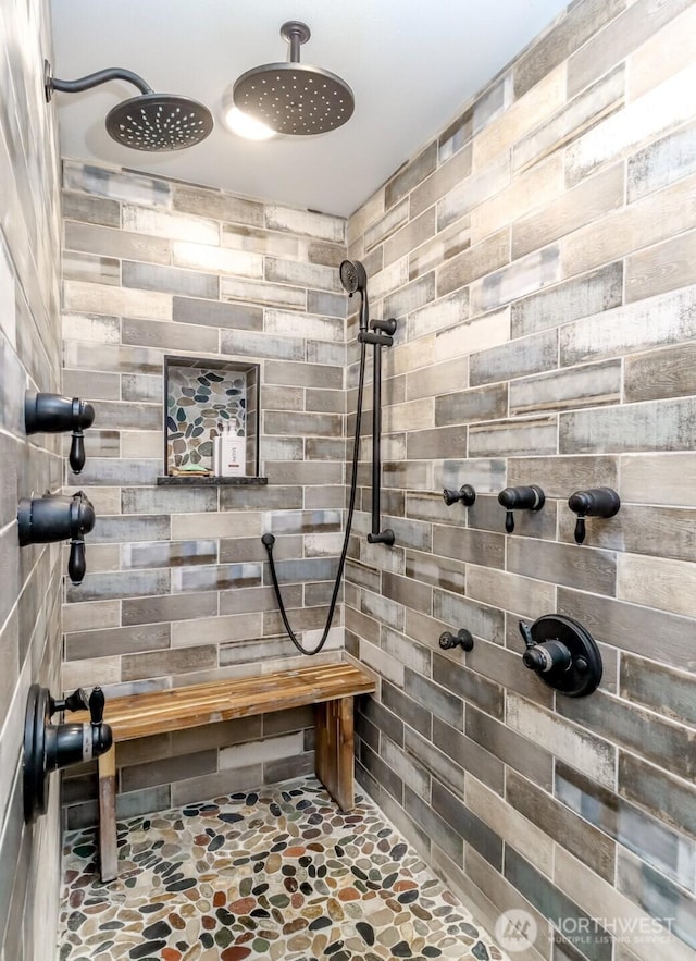 14045 Solberg Rd SE, Yelm, WA 98597 - bathroom with stone flooring and tiled shower