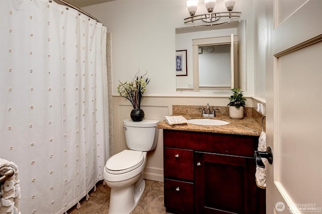 5829 112th Pl NE, Kirkland, WA 98033 - full bath featuring vanity, a chandelier, a wainscoted wall, tile patterned floors, and curtained shower