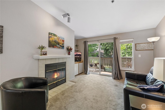 215 100th St SW Unit A305, Everett, WA 98204 - carpeted living area featuring a fireplace