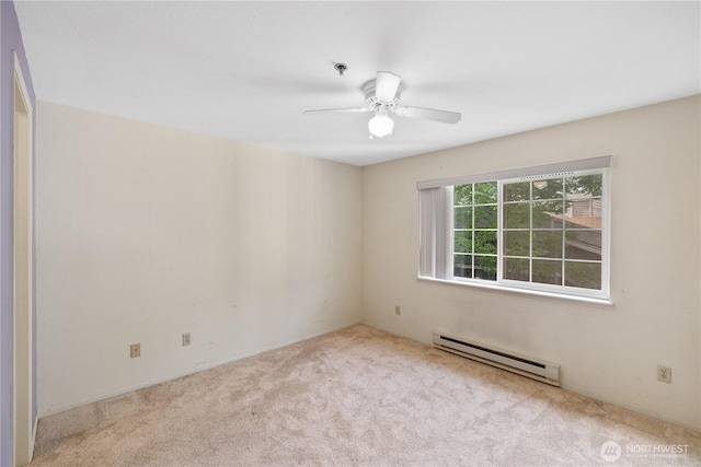 215 100th St SW Unit A305, Everett, WA 98204 - carpeted empty room with a baseboard radiator, a pendent fire sprinkler, and ceiling fan