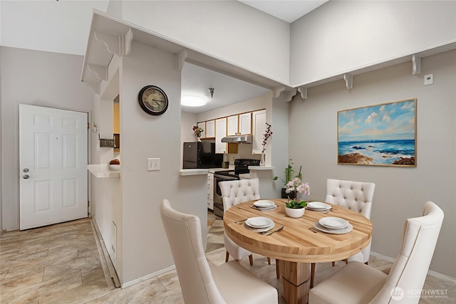 215 100th St SW Unit A305, Everett, WA 98204 - dining room featuring baseboards