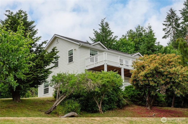 237 SW Oak Rd, Port Orchard, WA 98367 - view of home's exterior featuring a yard and a wooden deck