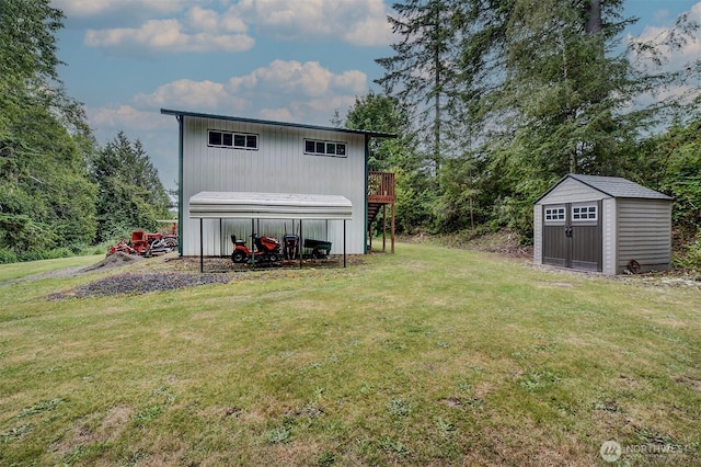 237 SW Oak Rd, Port Orchard, WA 98367 - rear view of property featuring a storage shed, a lawn, and a deck
