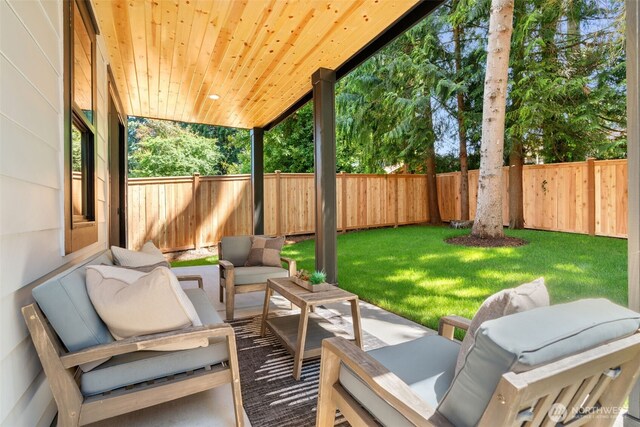 13005 NE 88th St, Kirkland, WA 98033 - fenced backyard featuring an outdoor living space and a patio area