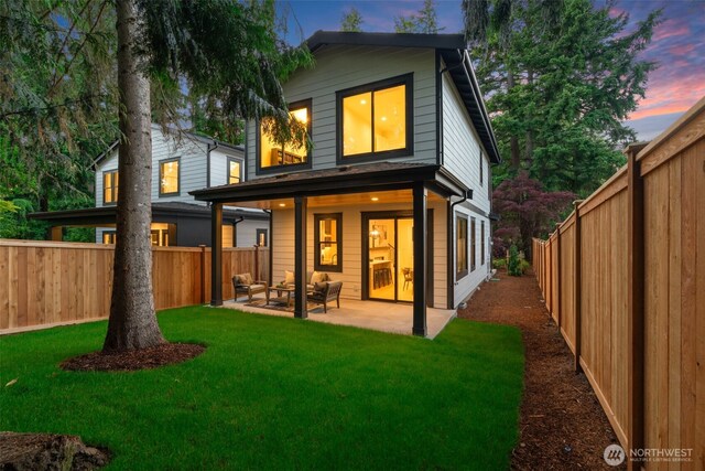 13005 NE 88th St, Kirkland, WA 98033 - rear view of property with a fenced backyard, a patio, and an outdoor living space