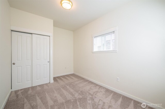 2226 King St, Bellingham, WA 98225 - unfurnished bedroom featuring carpet flooring and a closet