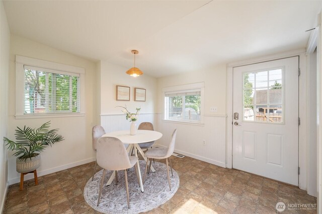 2226 King St, Bellingham, WA 98225 - dining space with wainscoting and stone finish flooring