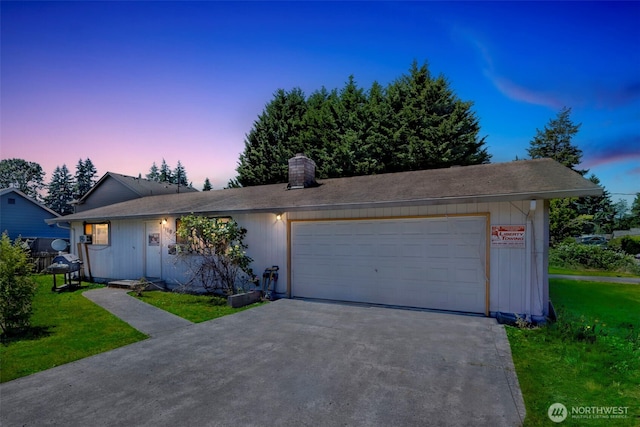 11104 Ainsworth Ave S, Tacoma, WA 98444 - ranch-style home with concrete driveway, a chimney, a yard, and a garage