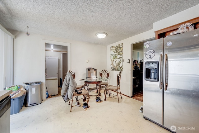 11104 Ainsworth Ave S, Tacoma, WA 98444 - dining room featuring wood finished floors and a textured ceiling