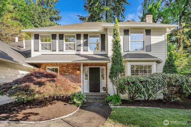 2892 160th Pl NE, Bellevue, WA 98008 - view of front of home with a chimney and a shingled roof