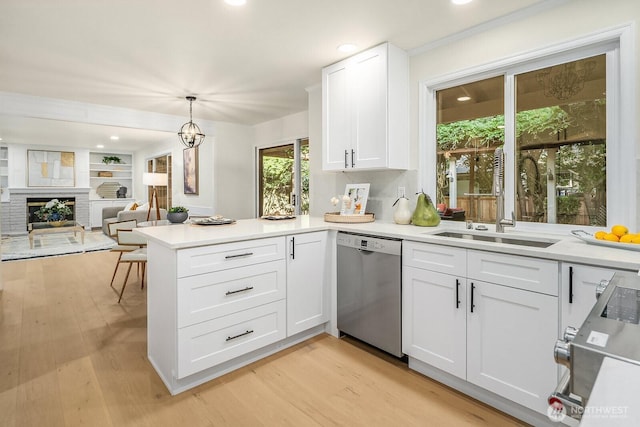 2892 160th Pl NE, Bellevue, WA 98008 - kitchen featuring stainless steel appliances, a peninsula, white cabinets, light countertops, and recessed lighting