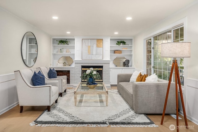 2892 160th Pl NE, Bellevue, WA 98008 - living area with light wood-style flooring, recessed lighting, and a fireplace