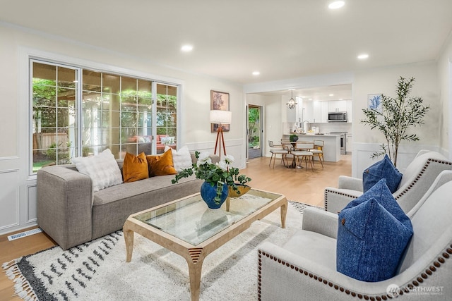 2892 160th Pl NE, Bellevue, WA 98008 - living room featuring recessed lighting and light wood-type flooring